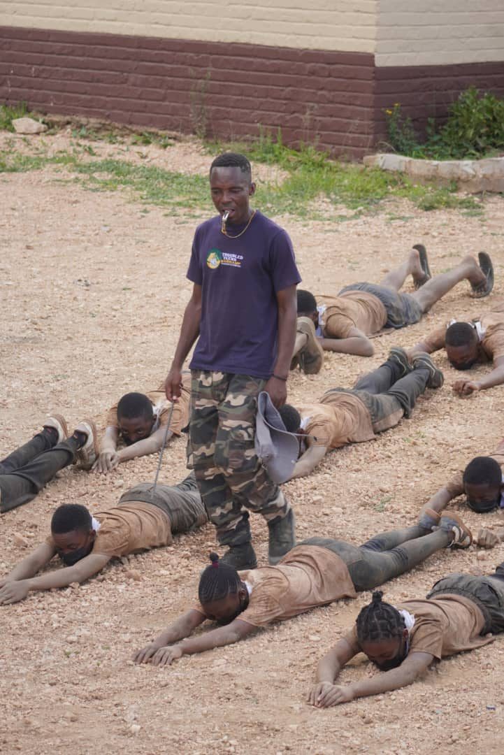 Participants doing physical training drills at boot camp